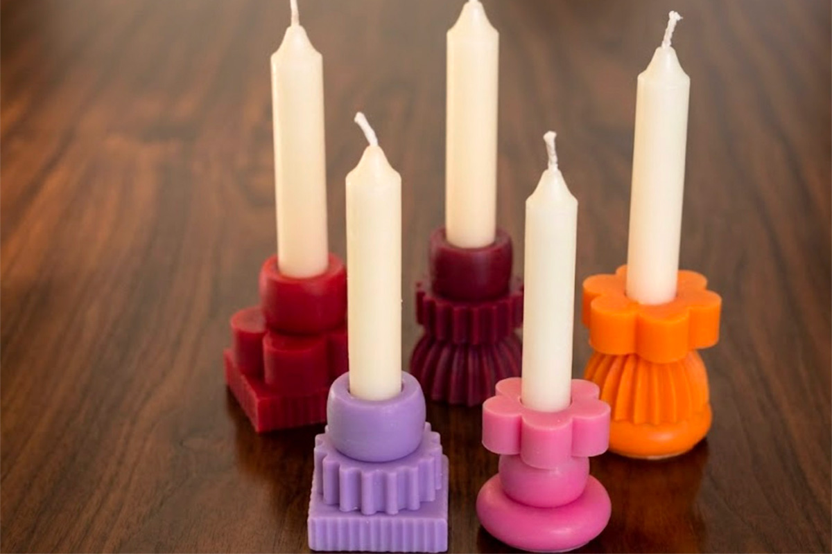 candele LUMINLIQUE in una cena d'estate
